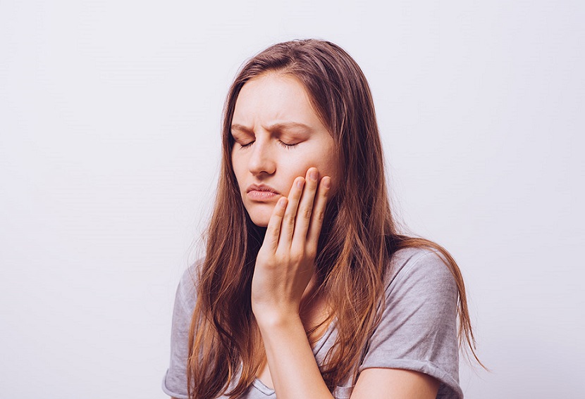 wisdom tooth pain symptoms